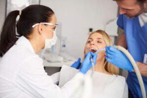 dentist examine teeth